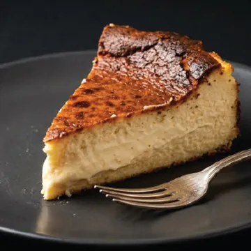 Slice of burnt Basque San Sebastián cheesecake