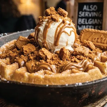 Dodo's Special Belgian waffle with ice cream, Biscoff crumb and chocolate drizzle